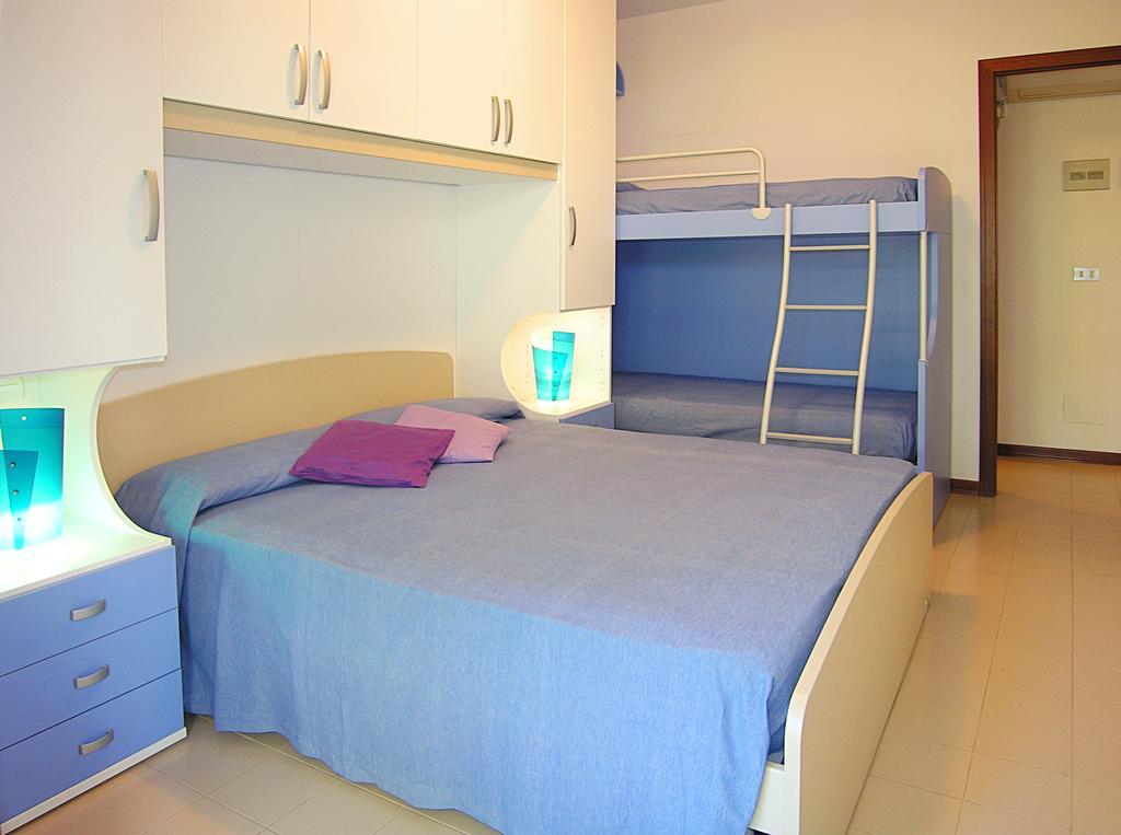 Apartment Gemini Con Piscina Бибионе Номер фото